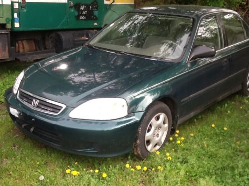 Green lx, 4-door, no transmission, body in good condition, interior is superb