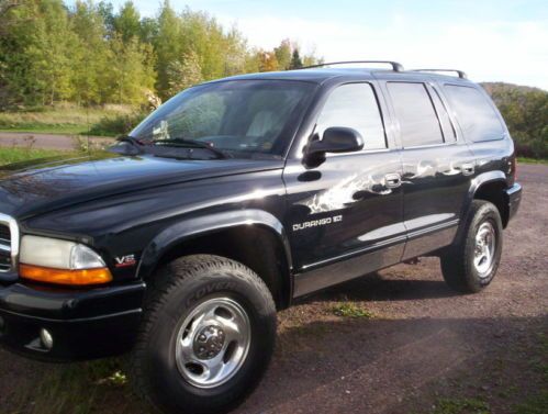 Black 2000 dodge durango - great shape, chrome grill and side panels
