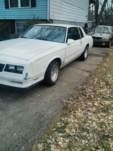 White 1981 monte carlo ss body style damage on right fender