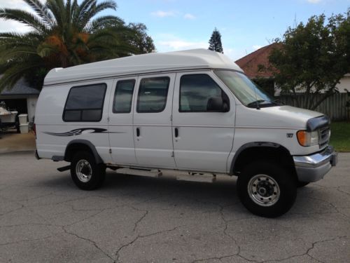 Ford e-350 extended cab, hi top,4 wheel drive, 7.3 diesel