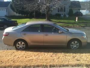 Toyota camry (mint condition, low miles)!!  must sell