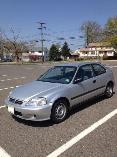 2000 honda civic cx hatchback  completely stock 5 speed very reliable