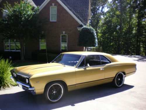 Gold matallic two door hardtop with new boss wheels and tires