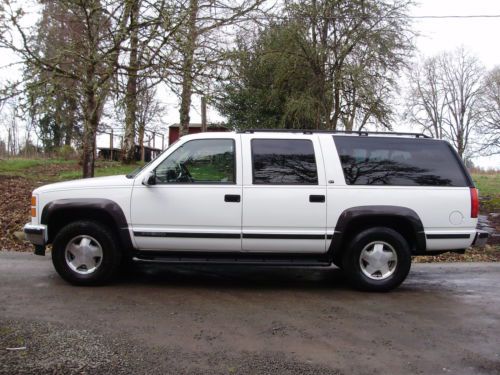1998 gmc suburban sierra slt 4wd,rust free,adult owned,very straight &amp; clean