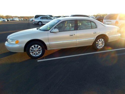 2000 lincoln continental sedan,rare pearl white beauty,leather,roof,nice no re$v