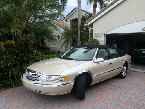 1999 lincoln continental rag top -low miles -under 62k-must look