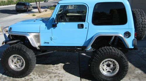 98' jeep wrangler ls1 350 hp  over $85k invested
