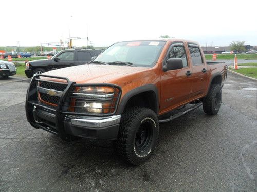 Crew cab 4dr, lifted 4x4, 3.5 high out put 5cyl, sunset orange, very clean !!!