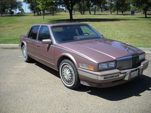 Awesome:1989 rose cadillac seville(89 yr.old lady previous owner)low reserve!w@w
