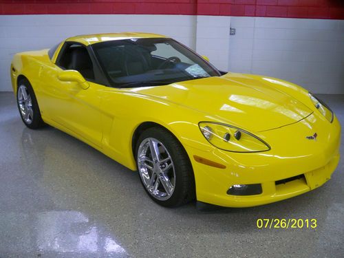 2007 chevrolet corvette coupe.  automatic, yellow, chrome z06 wheels!