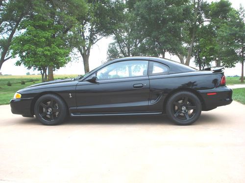 1996 mustang cobra. black on black, 15,800 miles very nice with a lot of extras