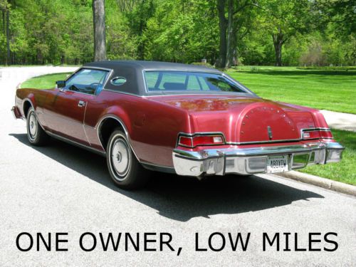 49,800 original miles, one-owner, red moondust metallic, black leather, the best