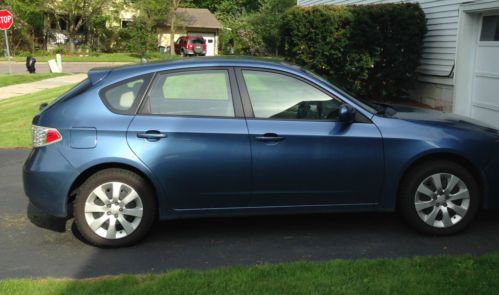 Hatchback, blue, 5 speed manual, great condition, 1 owner, clean carfax