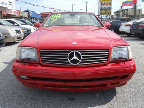 Beautiful red sl500 with low miles. garage kept. clean carfax. two owners