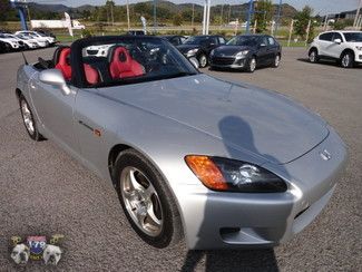 02 6 speed power convertible  red leather  2.0l dohc pgm-fi 16-valve i4 vtec