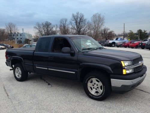 2005 chevy c/k 1500 ext. cab 4x4 short bed.. runs out well..clean carfax