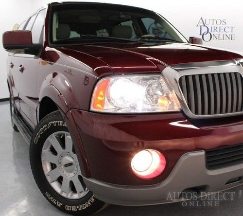 We finance 2004 lincoln navigator luxury 4wd 3rows 6cd htcldsts dvd mroof 5.4l