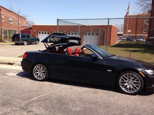 2008 bmw 335i hardtop convertible in black. with red leather interior. 51k miles