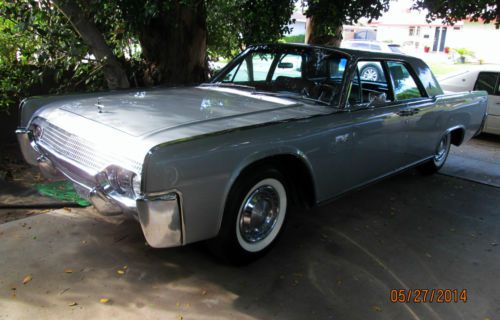 Fabulous classic 1961 lincoln continental silver suicide 4-door approx 47,050 mi
