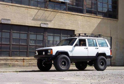 1993 jeep cherokee sport - lifted - offroad ready - 33" tires - longarms