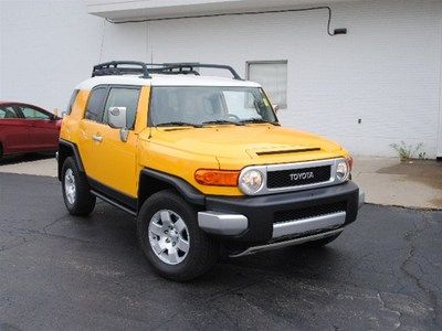 Yellow, 118612 miles, 4x4 at 4.0l , alloy wheels, cruise, leather, air, auto