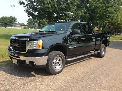 Leather crew cab  6.6l duramax diesel local trade sle great shape we finance!