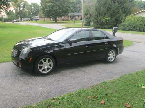 2004 cadillac cts black 3.6l 4-door v6 95,xxx miles.  leather, bose audio.