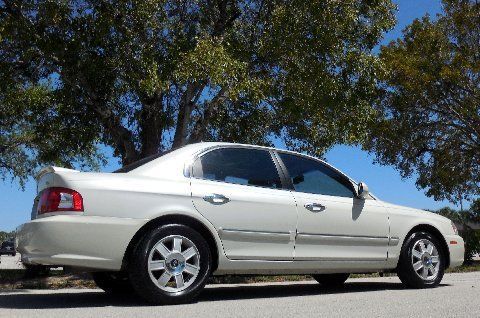 Pearl white~certified~leather~sunroof~cd~new tires~spoiler~04 05 06 07 camry