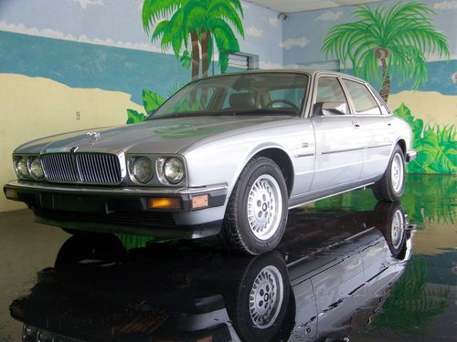 Silver, low miles, blue leather interior