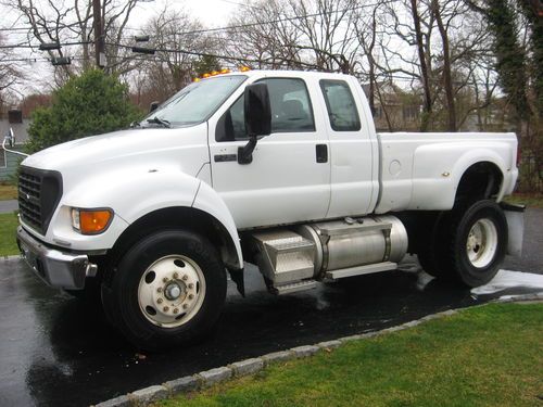 2000 ford diesel pick up ext cab for sale or tade. up graded cat 300 hp engine.