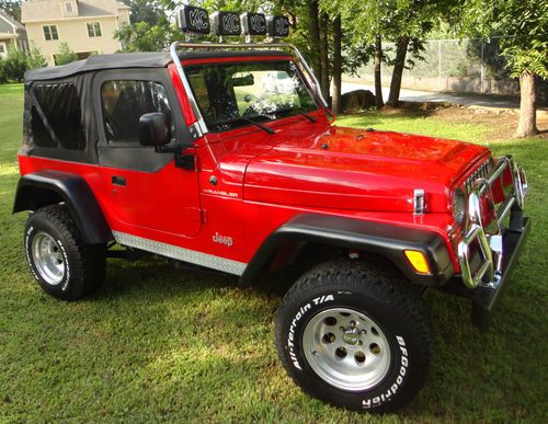 Nicest jeep wrangler sport; red paint, chrome trim, new carpet &amp; offroad package