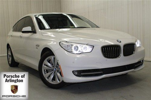 All wheel drive, bi-xenon lights, bluetooth, camera package, white low miles gt