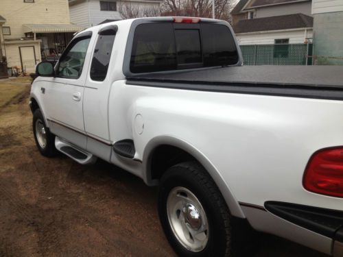Ford f-150 5.4 4x4 flare side super cab fully loaded looks,runs and drives great
