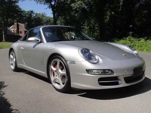 Metallic silver 911s convertible with blue interior and blue top