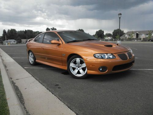 2006 pontiac gto base coupe 2-door 6.0l brazen orange