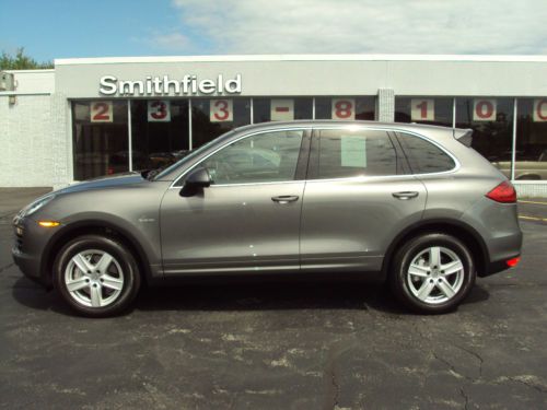 2012 cayenne s hybrid only 8,000 miles, msrp $86,575.