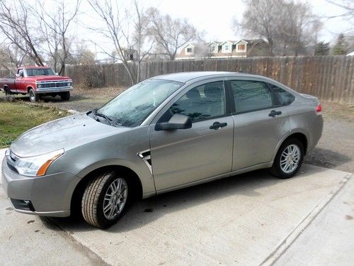 2008 ford focus 4 door, ac, cruise, am/fm/cd gray in color, excellent condition