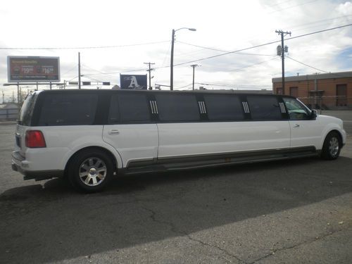 2004  limousine 140"  black and white low miles great and clean