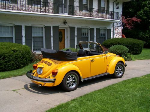 2800 miles, brand new condition, yellow, classic convertable,