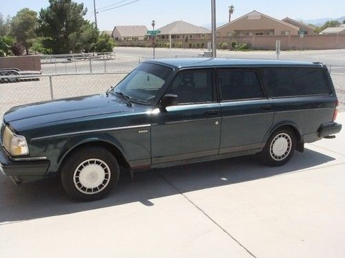 1992 volvo 240 base wagon 4-door 2.3l, drives great, minor issues, salvage title