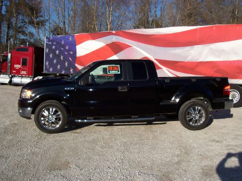 2005 ford f150 extended cab 2 wd with the 5.4 with previous salvage title