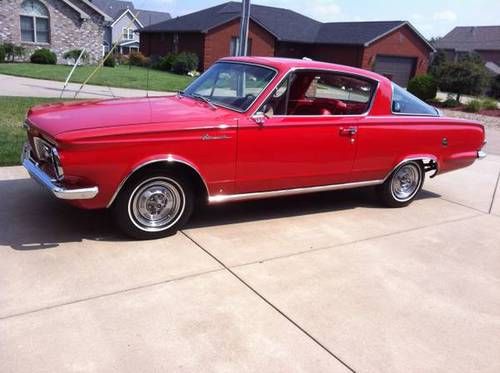 Classic red on red 1964 plymouth barracuda