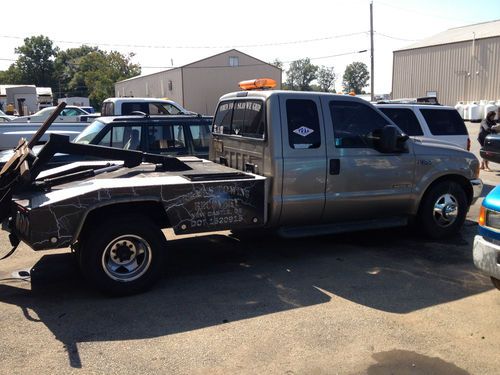 Ford f-350  ext cab repo truck dynamic lift tow truck