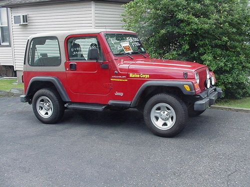 Red,4 cyl, manual trans, ,jeep wrangler  2001