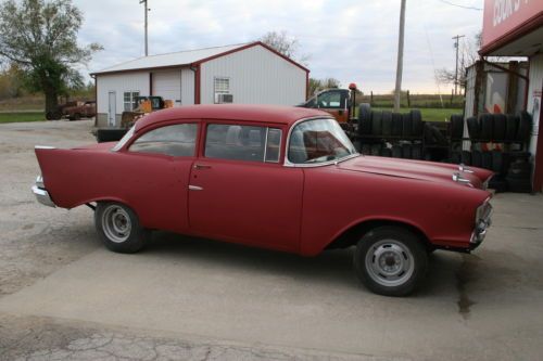 1957 chevy 2 door post 150. project new,paint,wheels,windshield etc,etc,etc