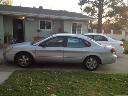 2004 taurus silver 190,000mi,strong quite mtr,trans nds work,body excl $1800 obo