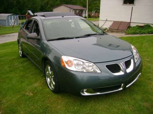 2006 pontiac g6 gt panoramic sunroof! very low miles! loaded v6 auto/stick trans