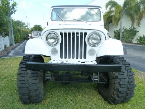 12 inch lift jeep, with super swamper tires.