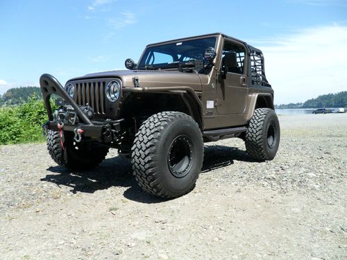 Lifted &amp; armored * jeep tj * only 29,000 miles! $$$ thousands in upgrades $$$
