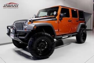 2010 jeep wrangler unlimited 4x4~27,418 miles~lift kit~35" tires~m/t wheels~auto